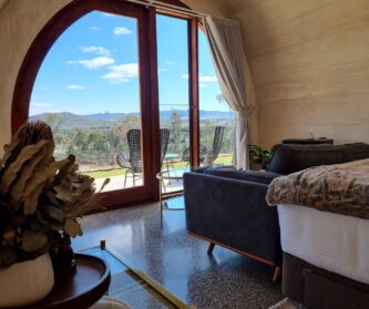 Views of the grapevines and distant hills from Barrel View Luxury Cabins.